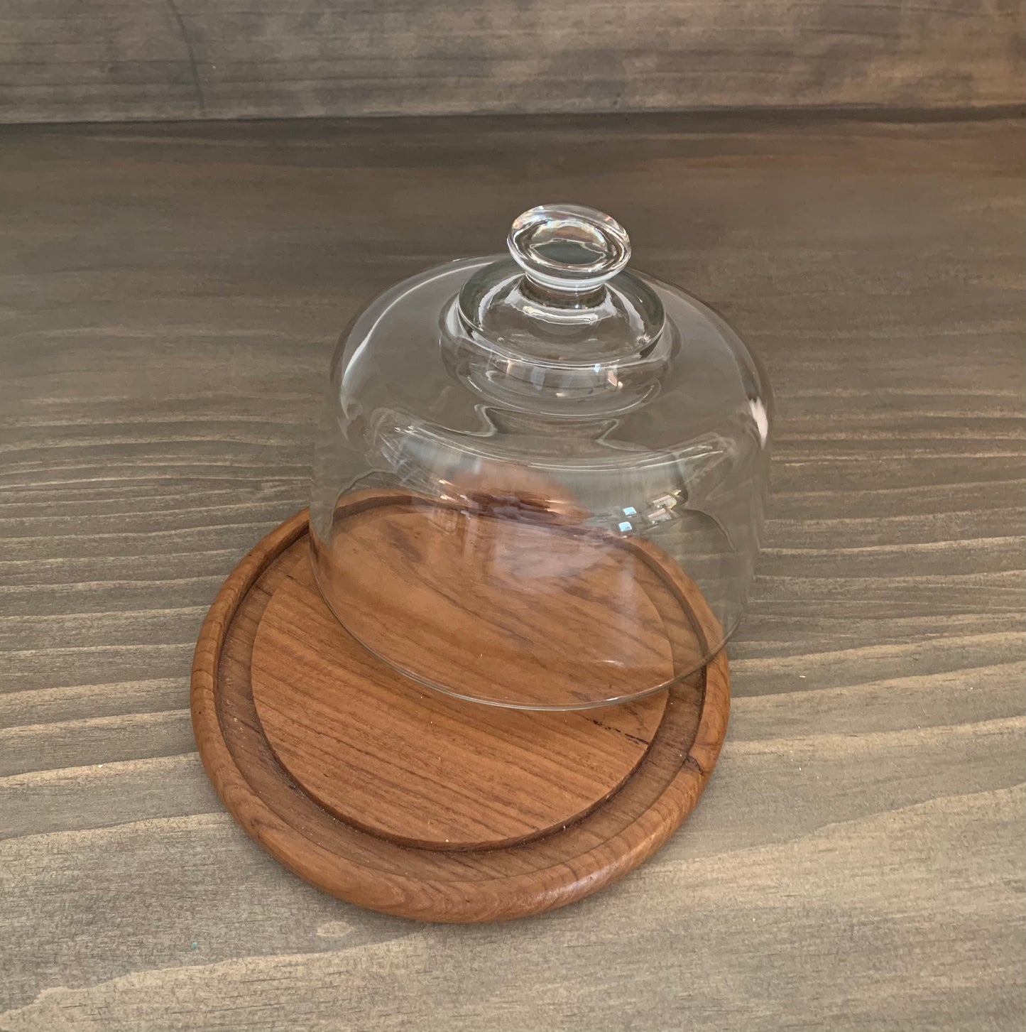 Vintage Dolphin teakwood cheese tray with heavy glass lid.