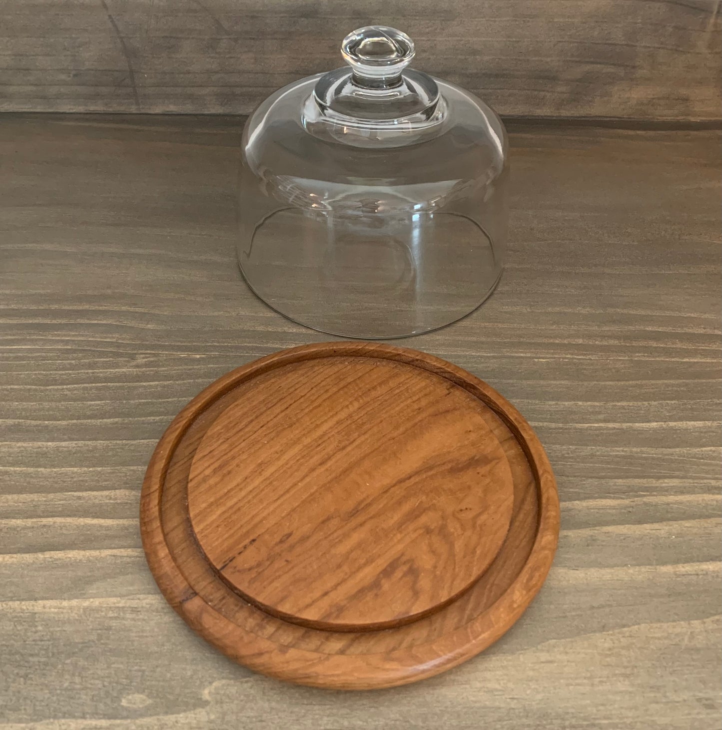 Vintage Dolphin teakwood cheese tray with heavy glass lid.
