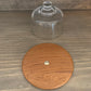 Vintage Dolphin teakwood cheese tray with heavy glass lid.